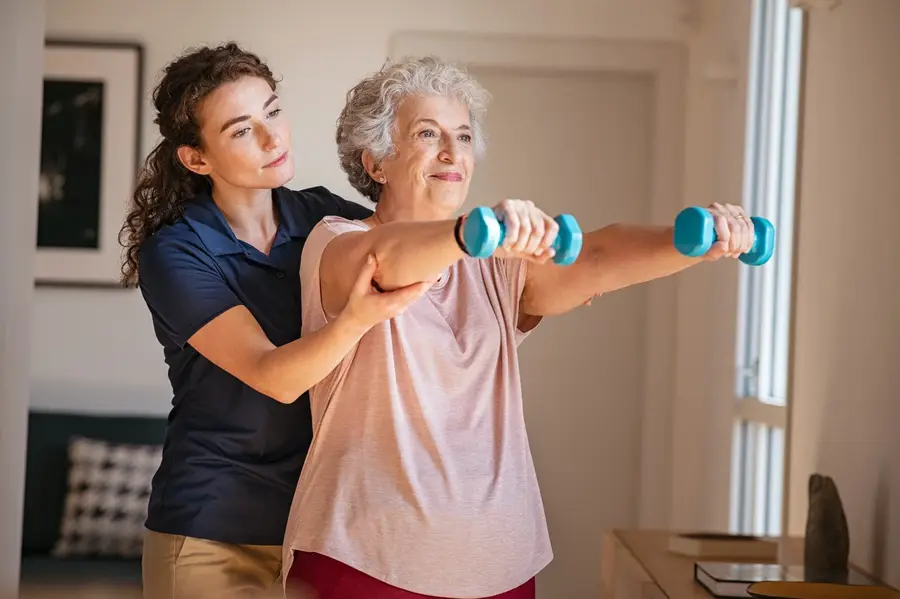 A Handled caregiver providing in-home care in the Greater Phoenix Valley